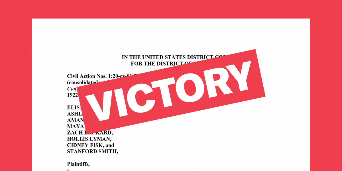 Victory text over original legal complaint in background